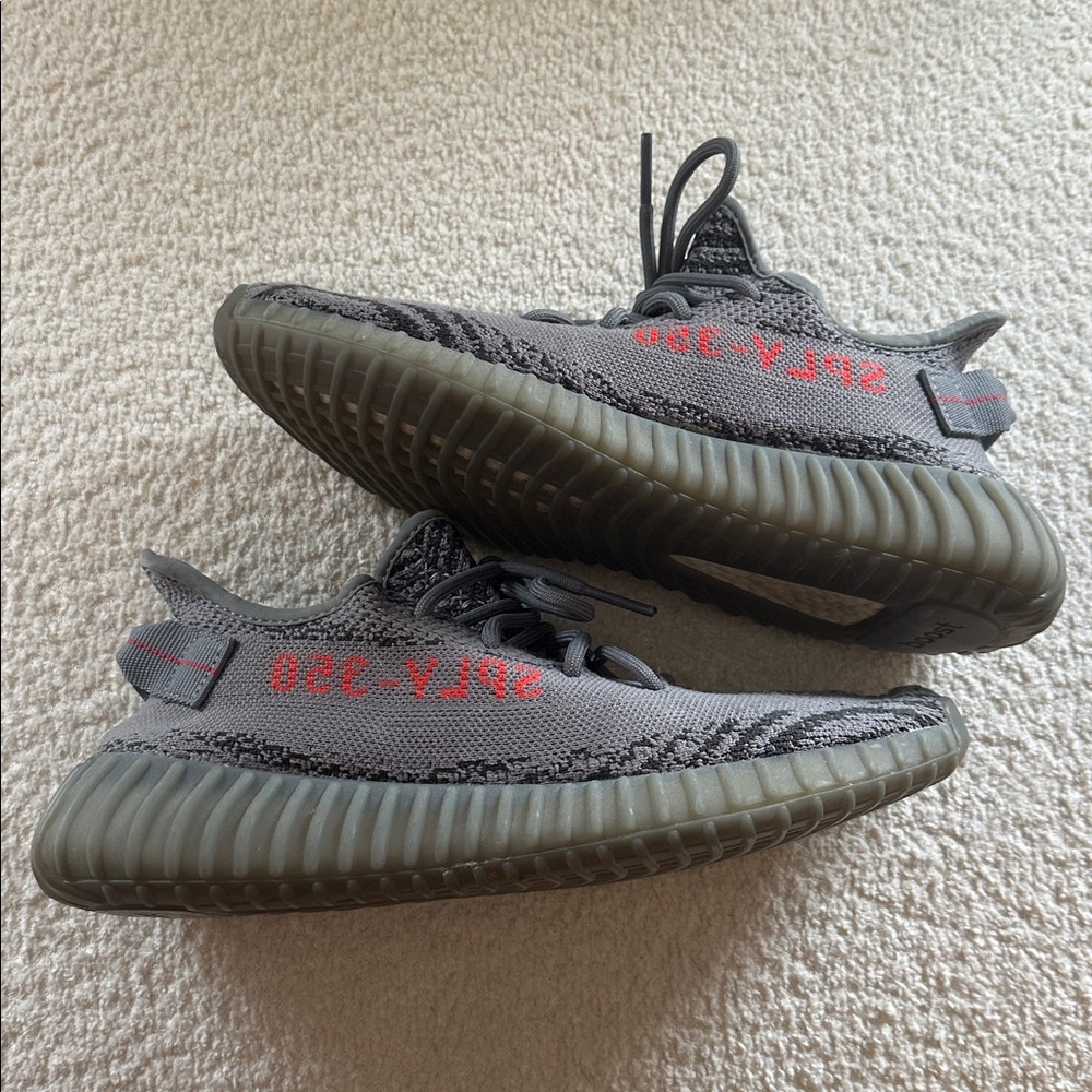 Yeezy Gray and Red Sneakers